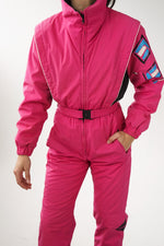 One piece Powderhorn ski suit, snow suit rose pour grande femme (XS) usé*