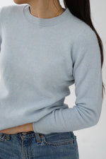 Chandail à manche longue probablement en cachemire bleu poudre pour femme taille S