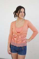 Veste crop cache-coeur S-M orange pâle