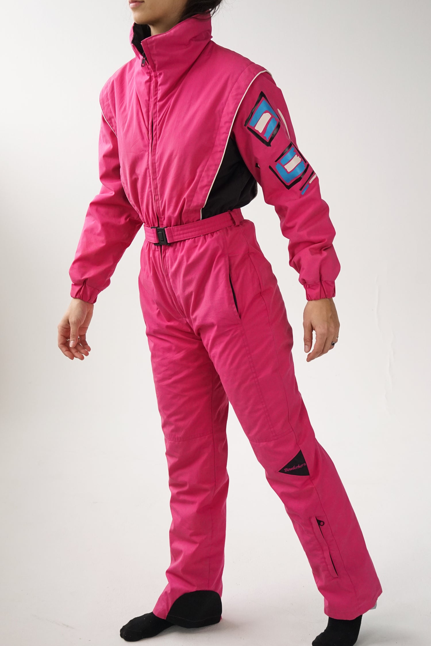 One piece Powderhorn ski suit, snow suit rose pour grande femme (XS) usé*