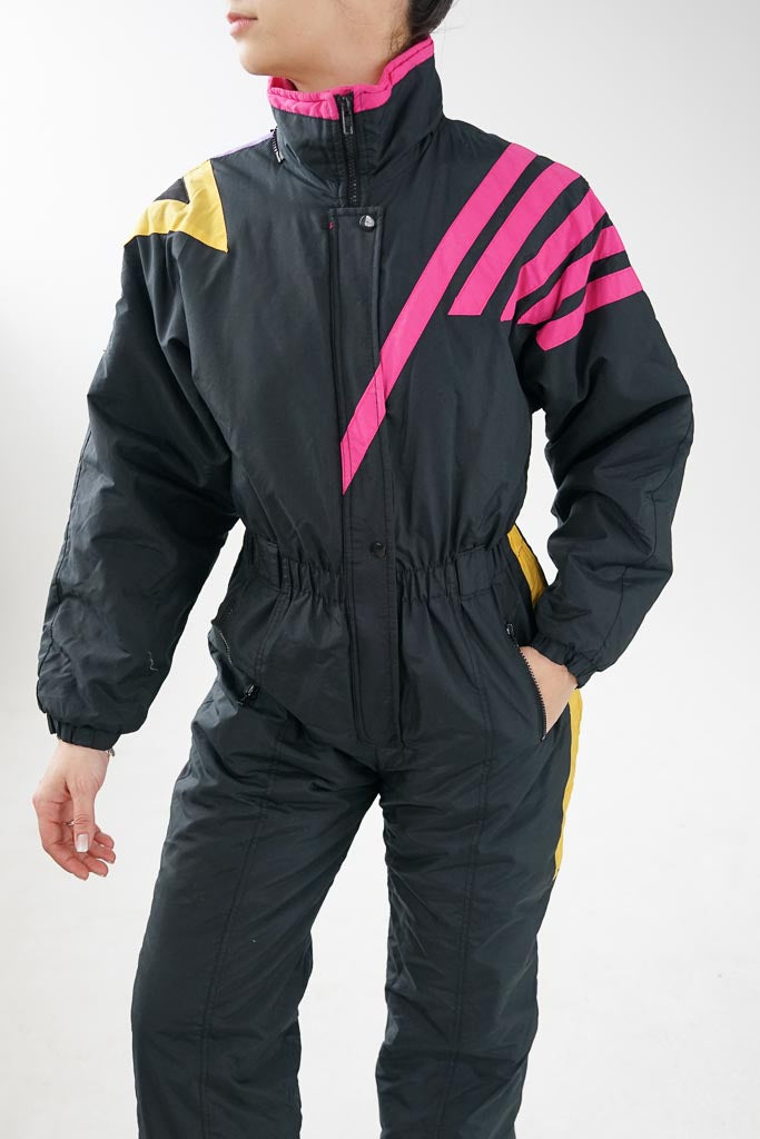 Retro 80s vintage one piece ski suit, black with yellow and magenta snow suit unisex size 16yo (S)