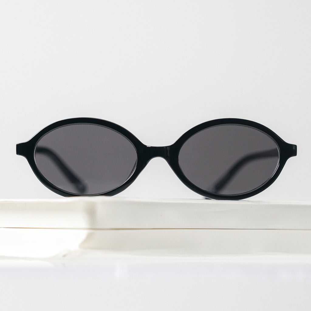 Ribotti Remake Charlie's Alex unisex sunglasses – black oval frame, black tinted lenses, slim retro 90s shape 