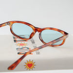 Ribotti Remake Freaky Slip sunglasses - unisex tortoiseshell oval frame, square angles, blue tinted lenses, slim retro chic 90s style 