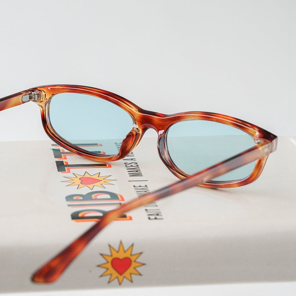 Ribotti Remake Freaky Slip sunglasses - unisex tortoiseshell oval frame, square angles, blue tinted lenses, slim retro chic 90s style 