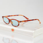 Ribotti Remake Freaky Slip sunglasses - unisex tortoiseshell oval frame, square angles, blue tinted lenses, slim retro chic 90s style 