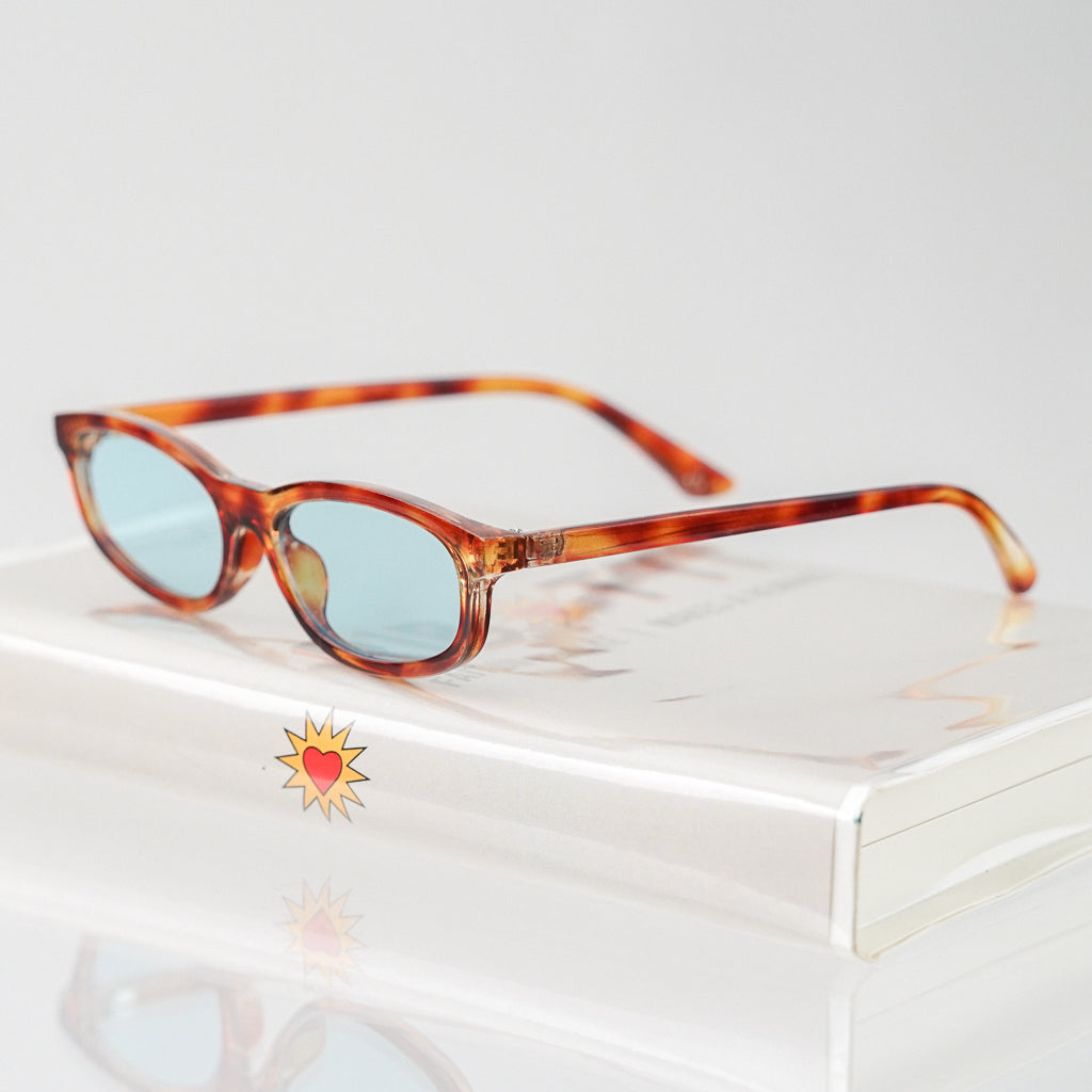 Ribotti Remake Freaky Slip sunglasses - unisex tortoiseshell oval frame, square angles, blue tinted lenses, slim retro chic 90s style 