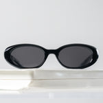 Ribotti Remake Girls Regina unisex sunglasses - oval cat-eye black frame, vintage 90s chic style, black tinted lenses 