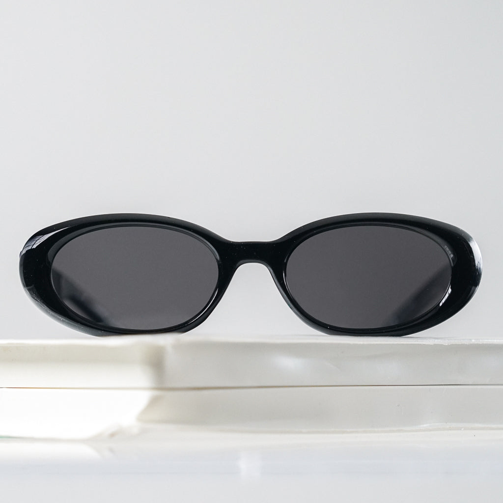 Ribotti Remake Girls Regina unisex sunglasses - oval cat-eye black frame, vintage 90s chic style, black tinted lenses 