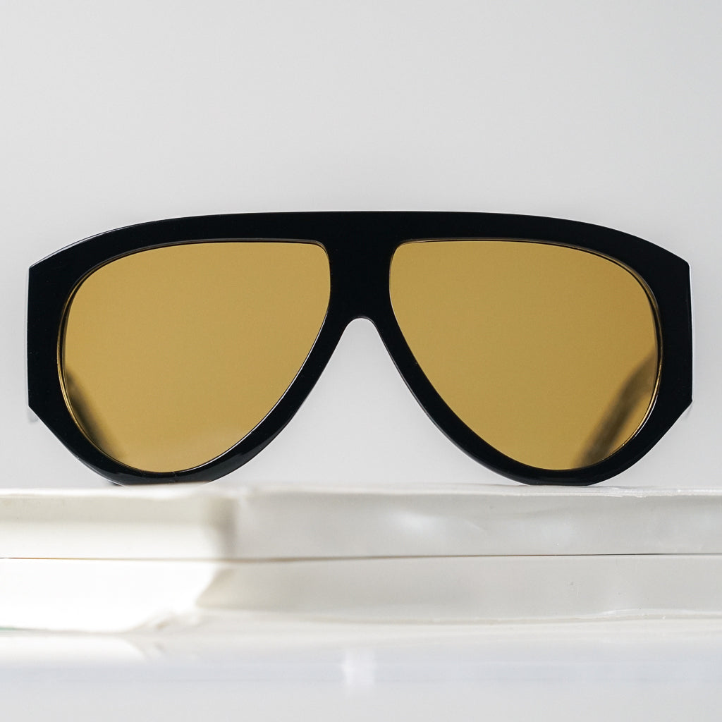 Ribotti Remake Grace unisex sunglasses -  vintage 90s style, round oversized black frame, gold tinted lenses 