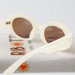 Ribotti Remake Kurt unisex sunglasses - 90s grunge style, oval ivory frame, brown tinted lenses 