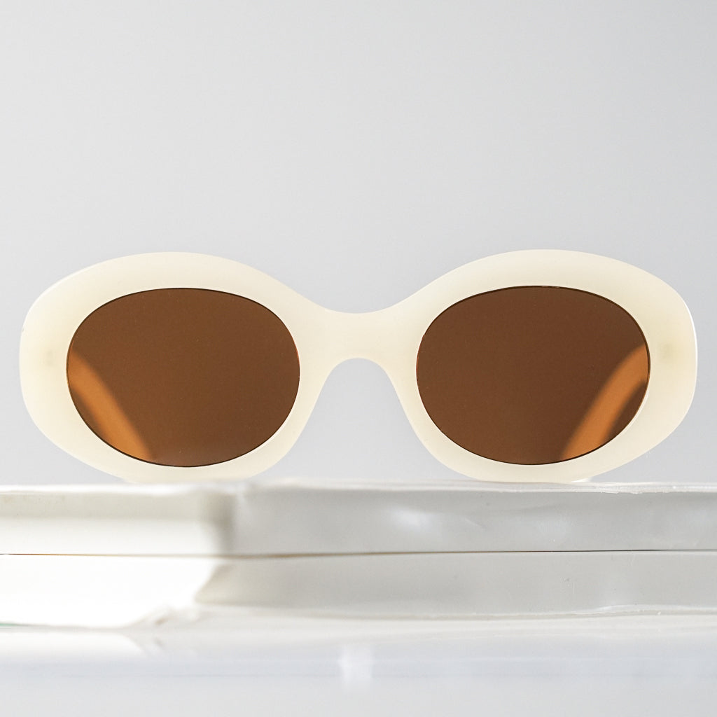 Ribotti Remake Kurt unisex sunglasses - 90s grunge style, oval ivory frame, brown tinted lenses