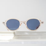 Ribotti Remake Léon Lepro unisex sunglasses - timeless minimalist 90s style, round clear frame, blue tinted lenses 