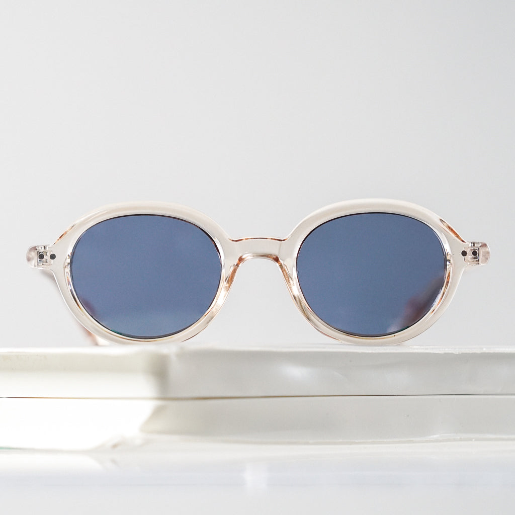 Ribotti Remake Léon Lepro unisex sunglasses - timeless minimalist 90s style, round clear frame, blue tinted lenses 