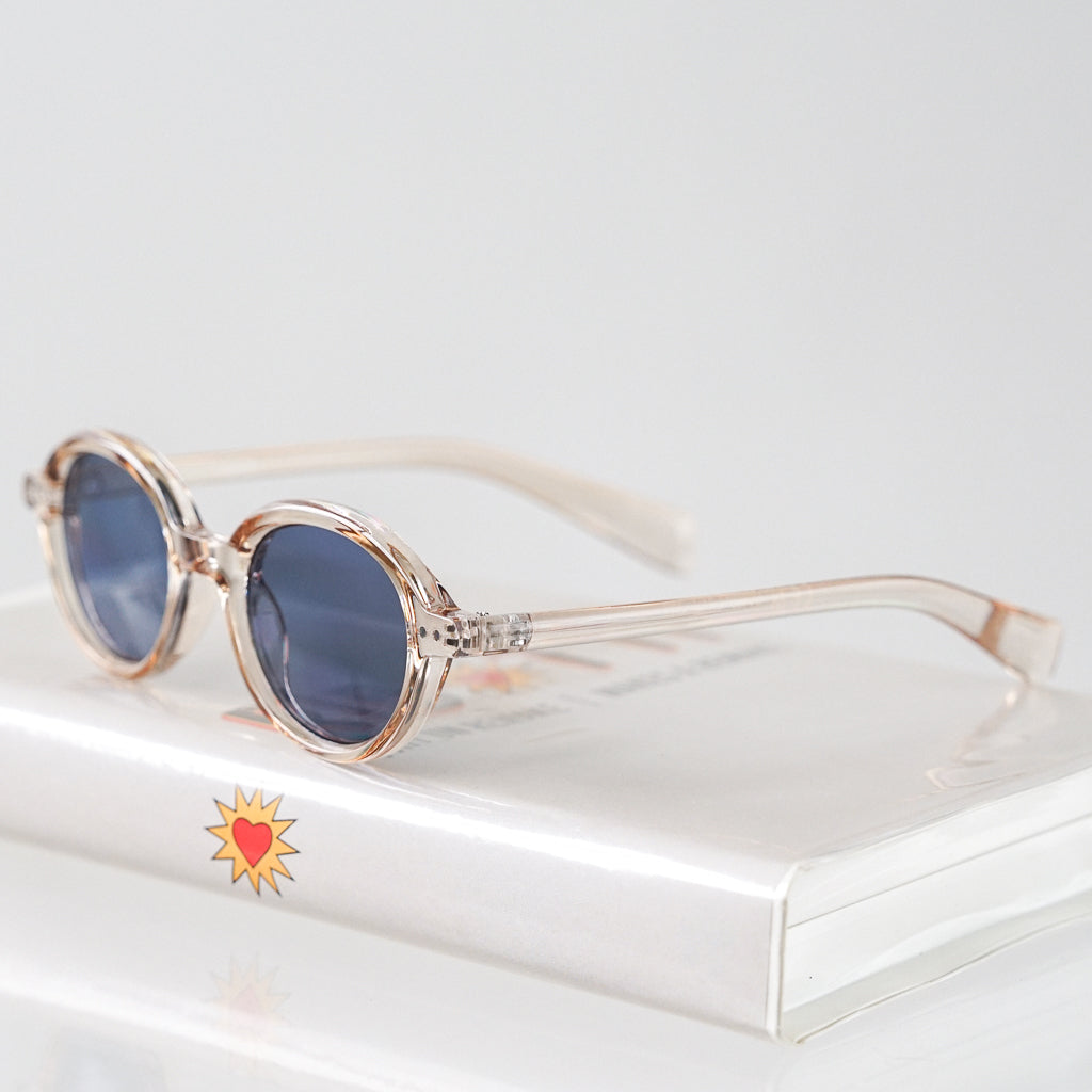 Ribotti Remake Léon Lepro unisex sunglasses - timeless minimalist 90s style, round clear frame, blue tinted lenses 