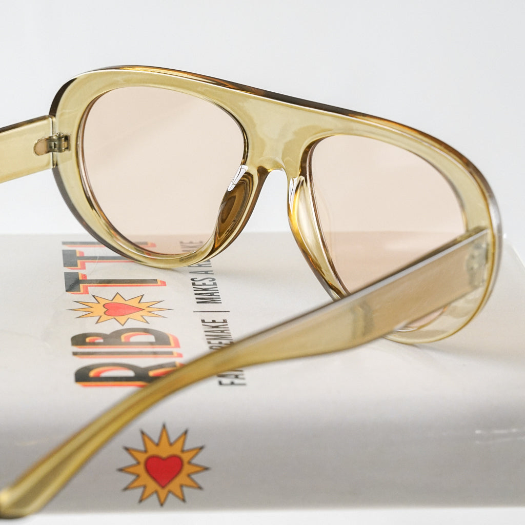 Ribotti Remake Racing Meryl unisex sunglasses - retro chic 90s style, round oversized gold clear frame, pink tinted lenses 