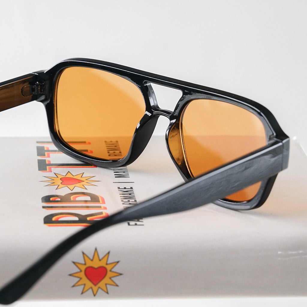 Ribotti Remake Pulp Jules unisex sunglasses - retro 90s style, aviator black frame, orange tinted lenses 