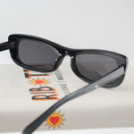 Ribotti Remake Spy Carmen unisex sunglasses - black rectangular cat-eye frame, black tinted lenses, retro-futuristic minimalist 2000s style 