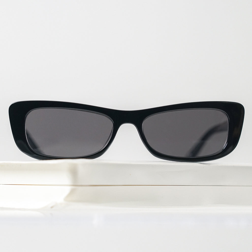 Ribotti Remake Spy Carmen unisex sunglasses - black rectangular cat-eye frame, black tinted lenses, retro-futuristic minimalist 2000s style 