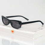 Ribotti Remake Spy Carmen unisex sunglasses - black rectangular cat-eye frame, black tinted lenses, retro-futuristic minimalist 2000s style 