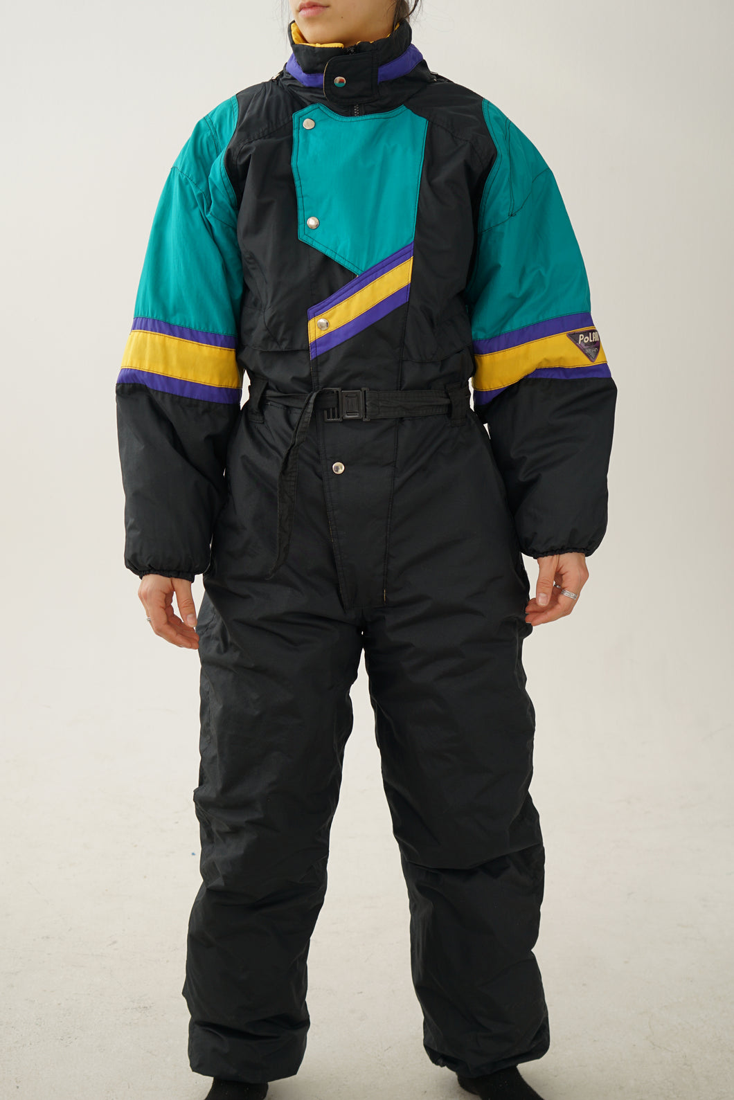 Vintage one piece New Face ski suit, snow suit noir avec couleurs M