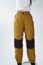 Load image into Gallery viewer, Vintage golden snow pants with patches unisex size S-M
