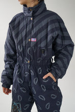 Load image into Gallery viewer, Vintage one piece Skila ski suit, dark blue with patterns snow suit size 40
