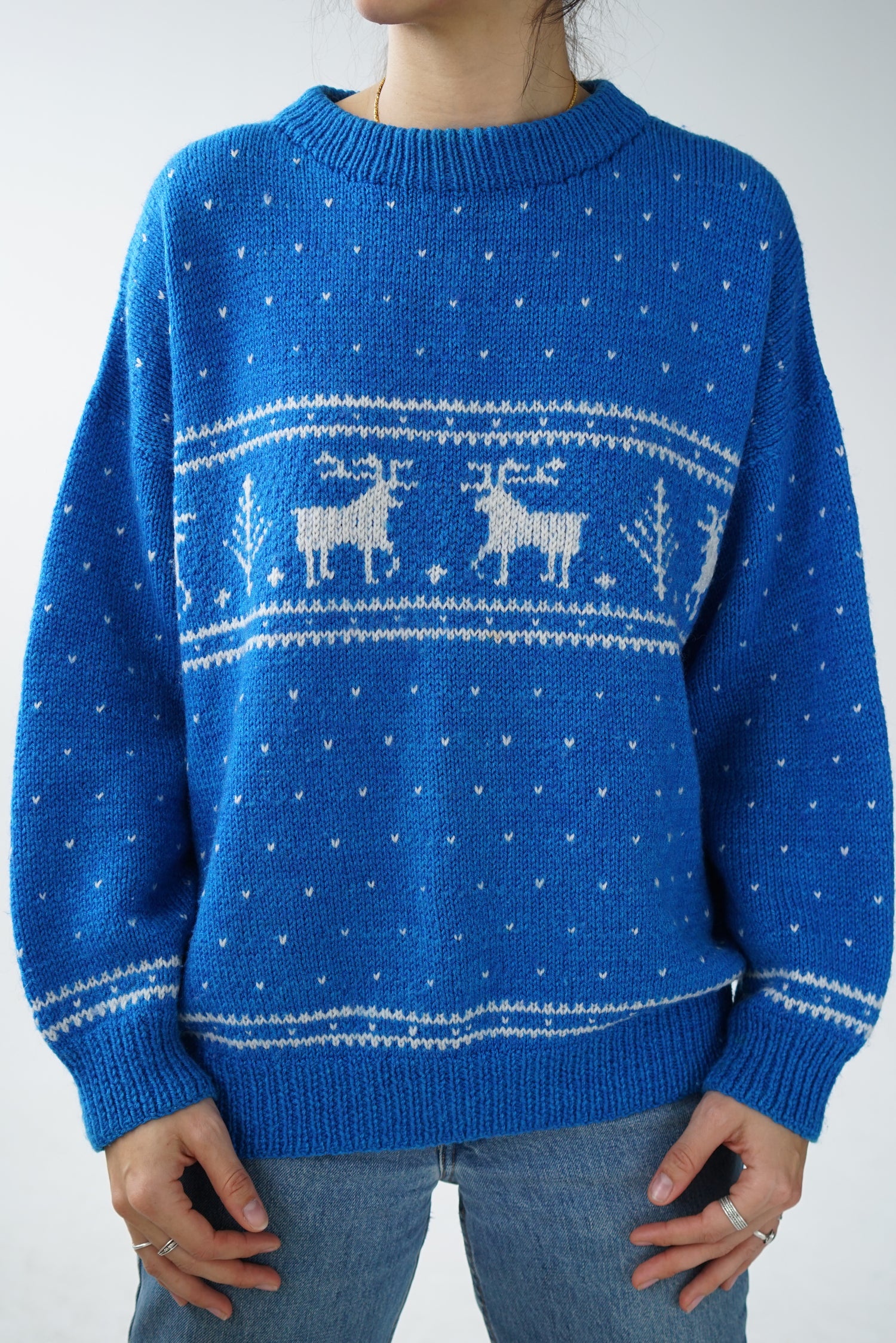 Festive sweater with winter patterns