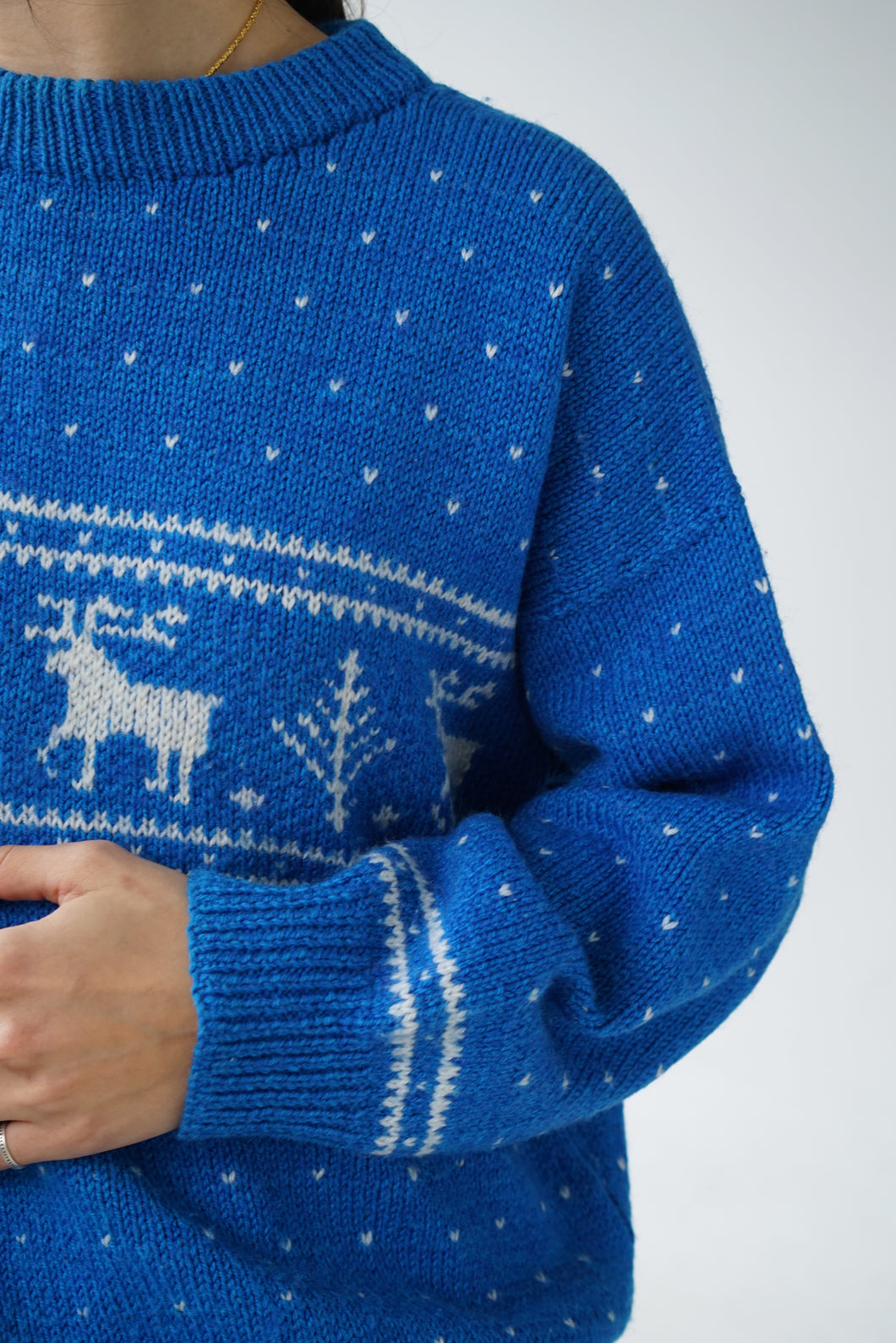Festive sweater with winter patterns