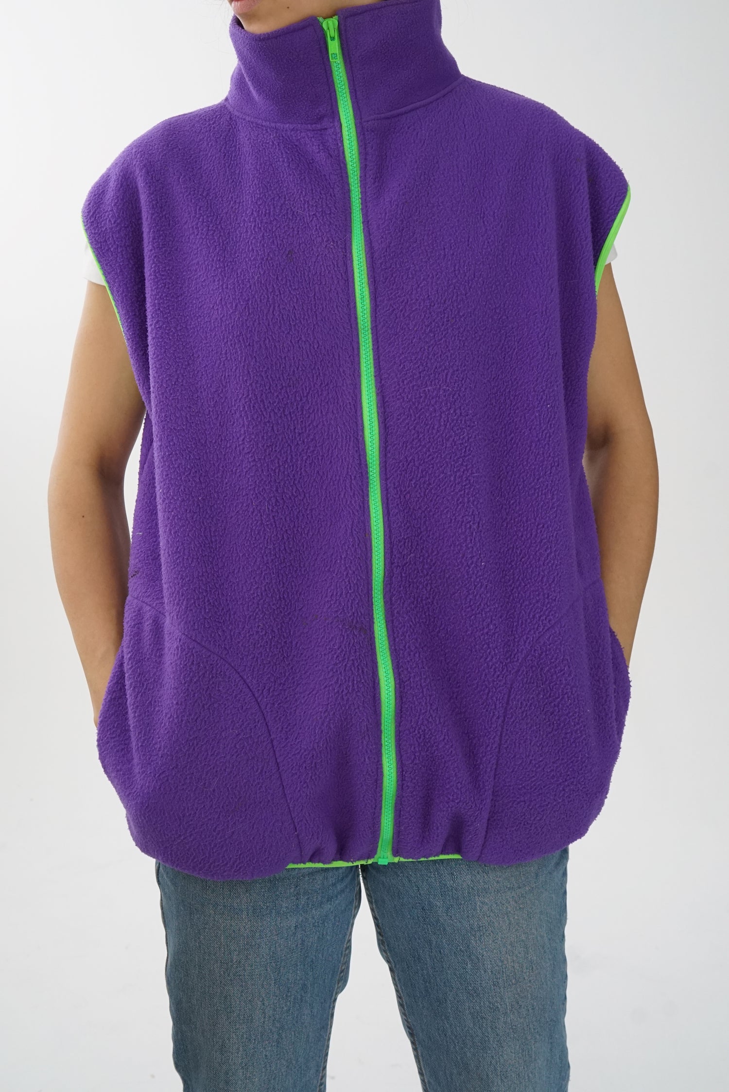 Veste sans manche en polar mauve et vert fluo taille L