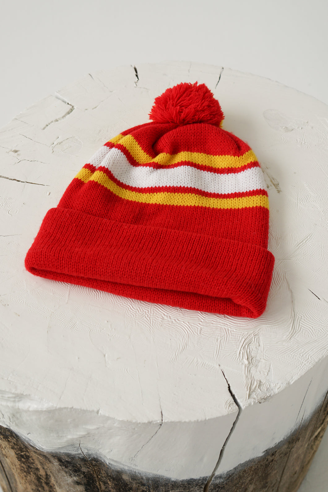 Red with white and yellow stripes beanie with pom-pom size S-M