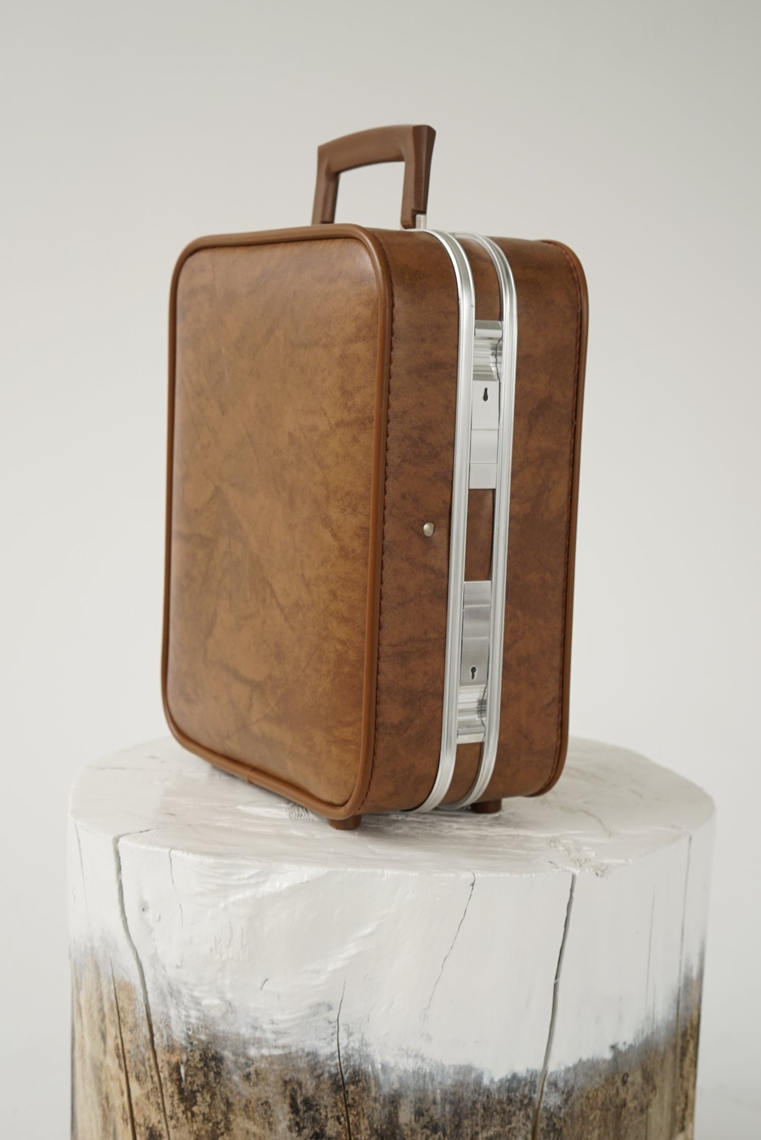 Vintage portable mini bar suitcase in brown faux leather