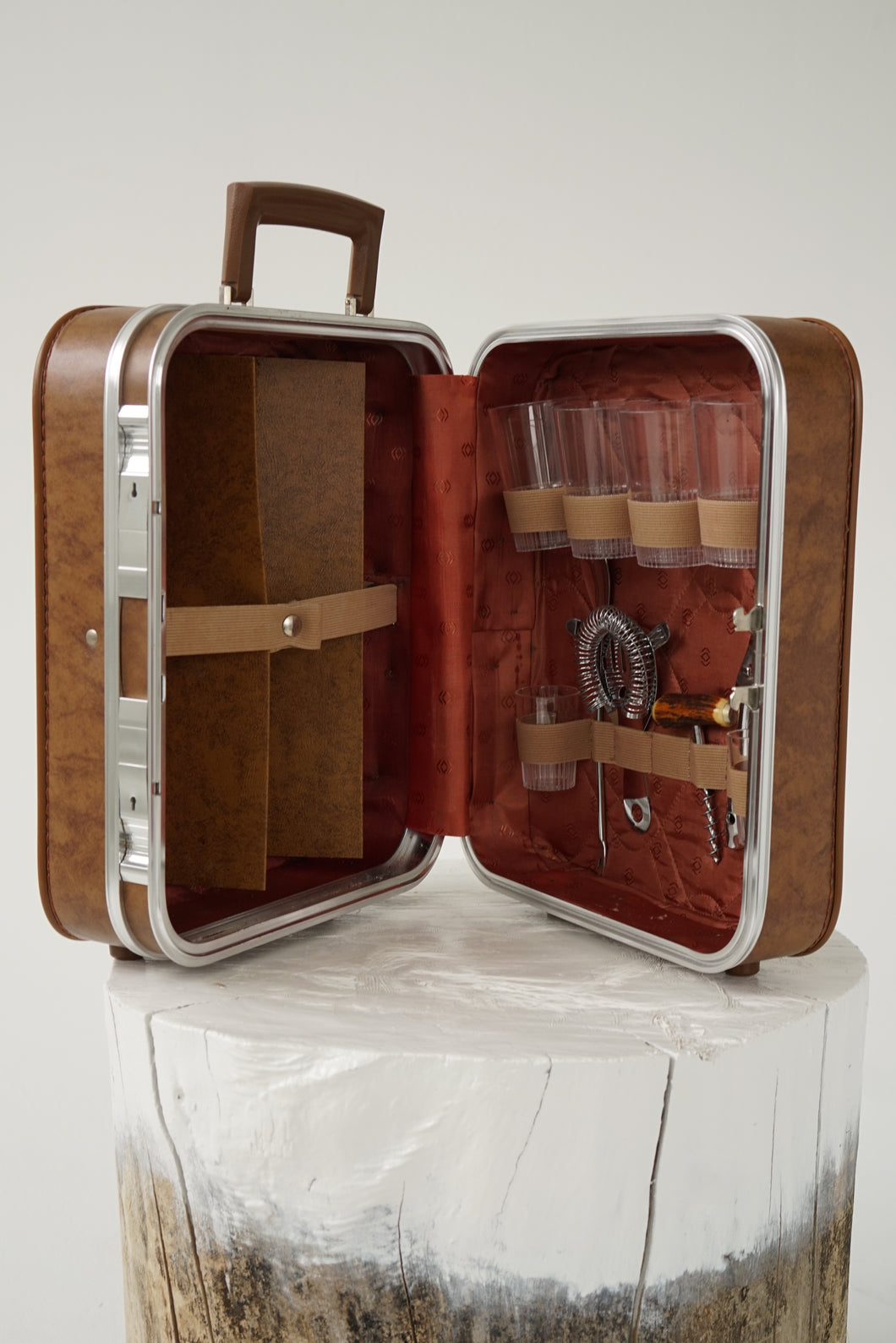 Vintage portable mini bar suitcase in brown faux leather